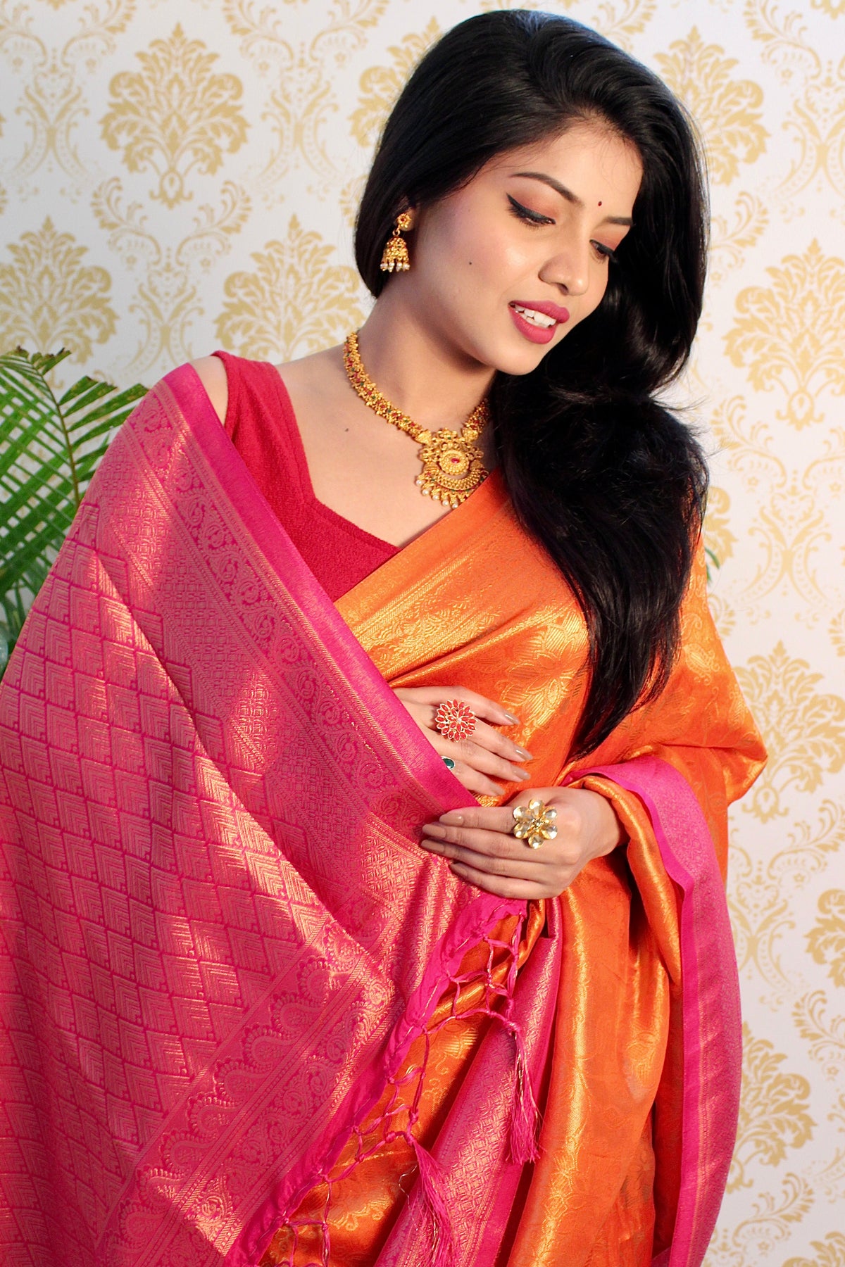 Orange and Pink color Zari Golden Weaving Rich Saree