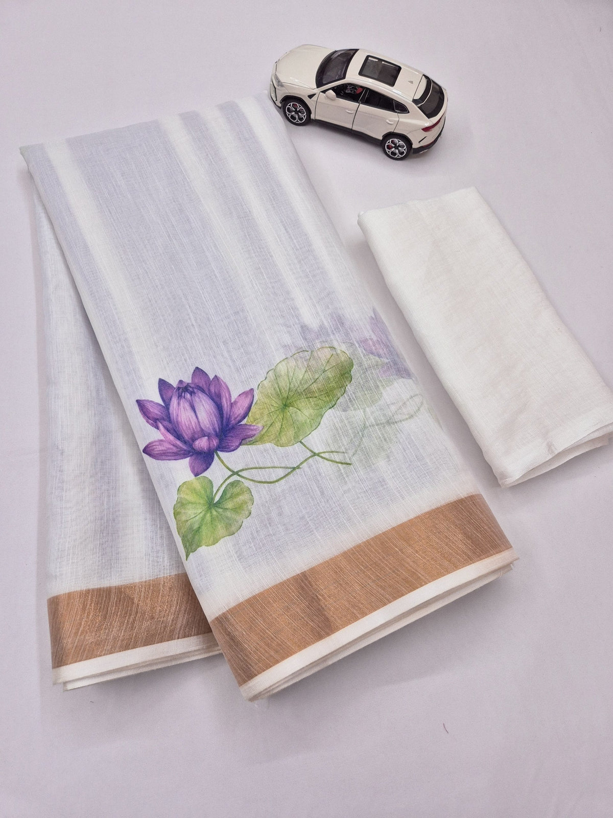 Off-White and Purple Linen Lotus Saree with Zari Border