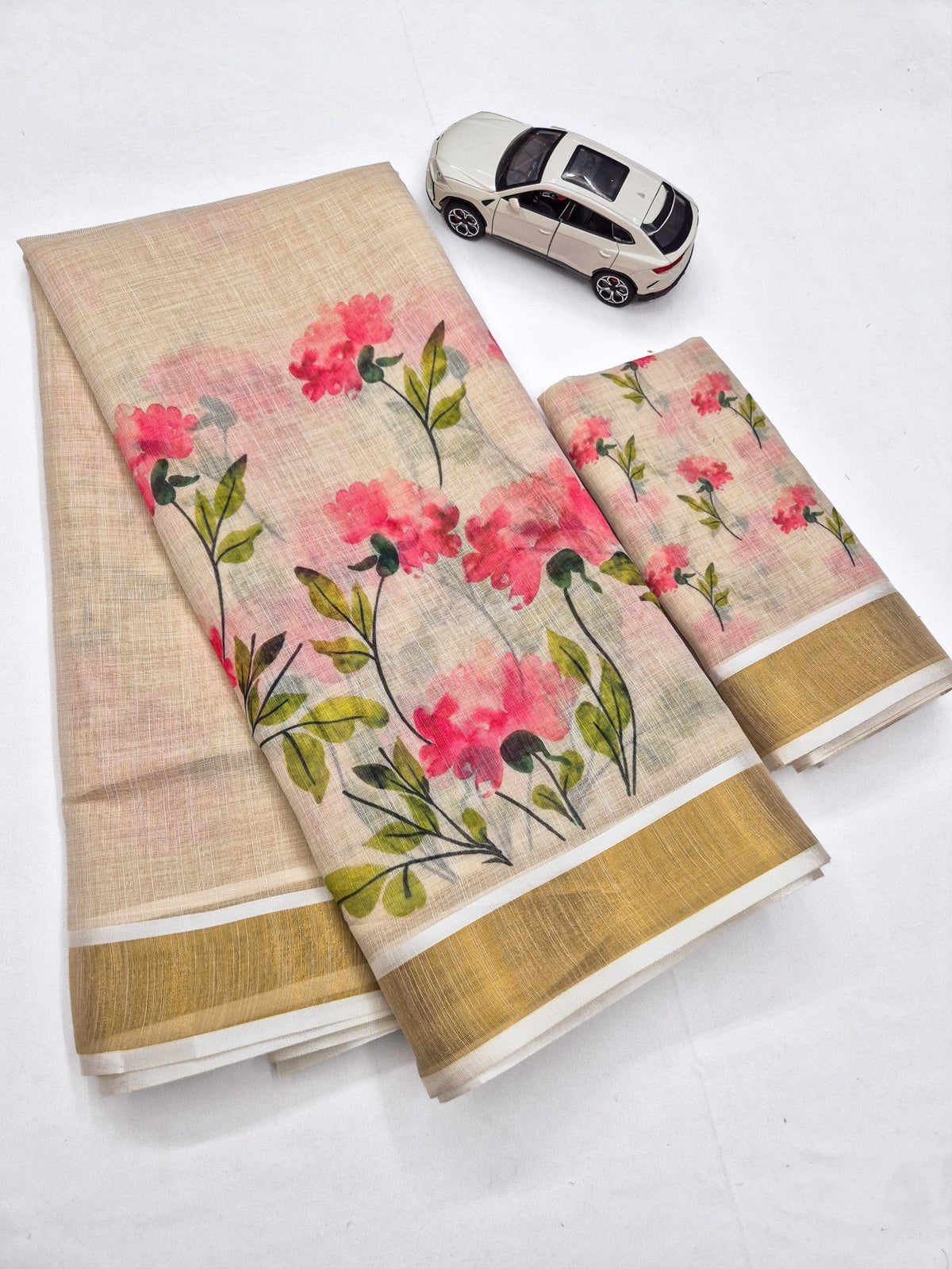 Pink Linen Floral Print Saree with Zari Border